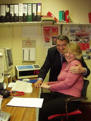 Graham Taylor OBE helps Lottery Manager Lynda Nixon make the draw for the Imps Birthday Lotto